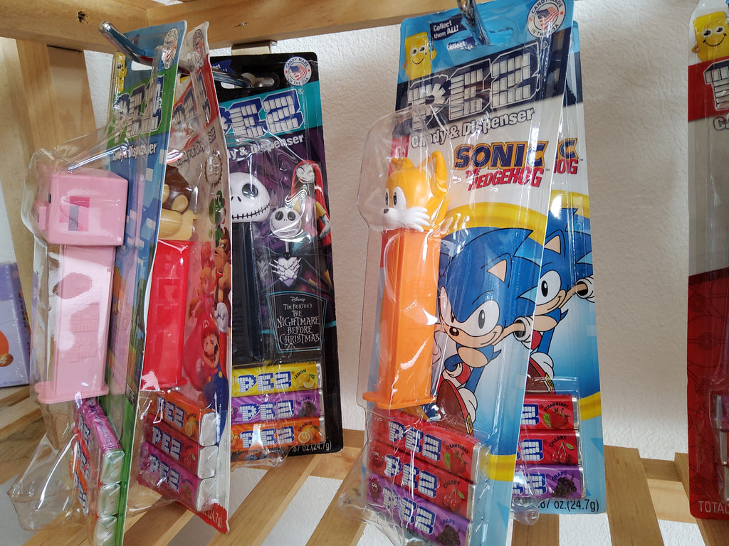 PEZ CANDY AND DISPENSER